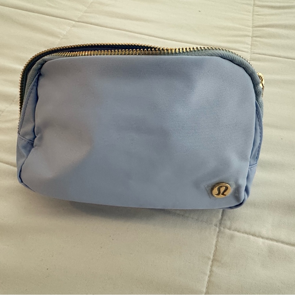 Lululemon Athletica Blue Cosmetic Bag with Gold Accents